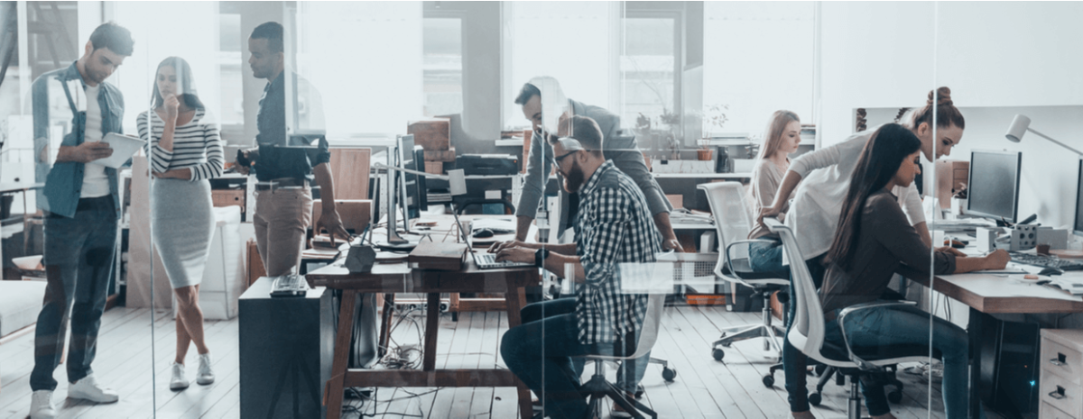 A group of employees working in office.